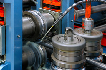 industrial machinery processing tubular steel